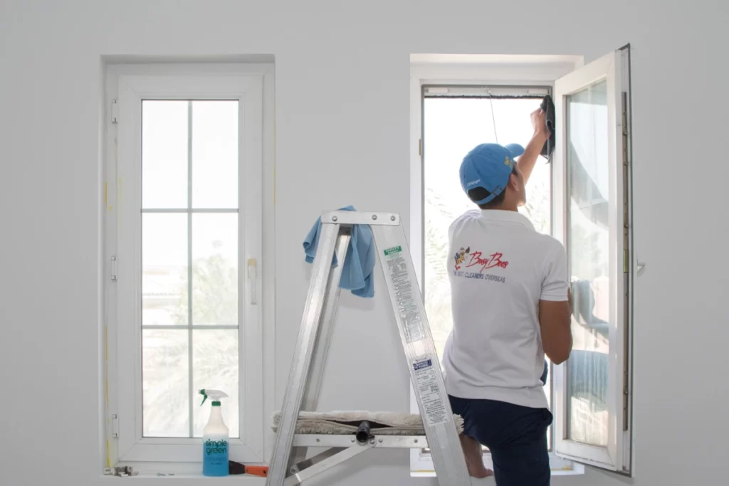 A Professional Mail Maid Cleaning Window in Dubai
